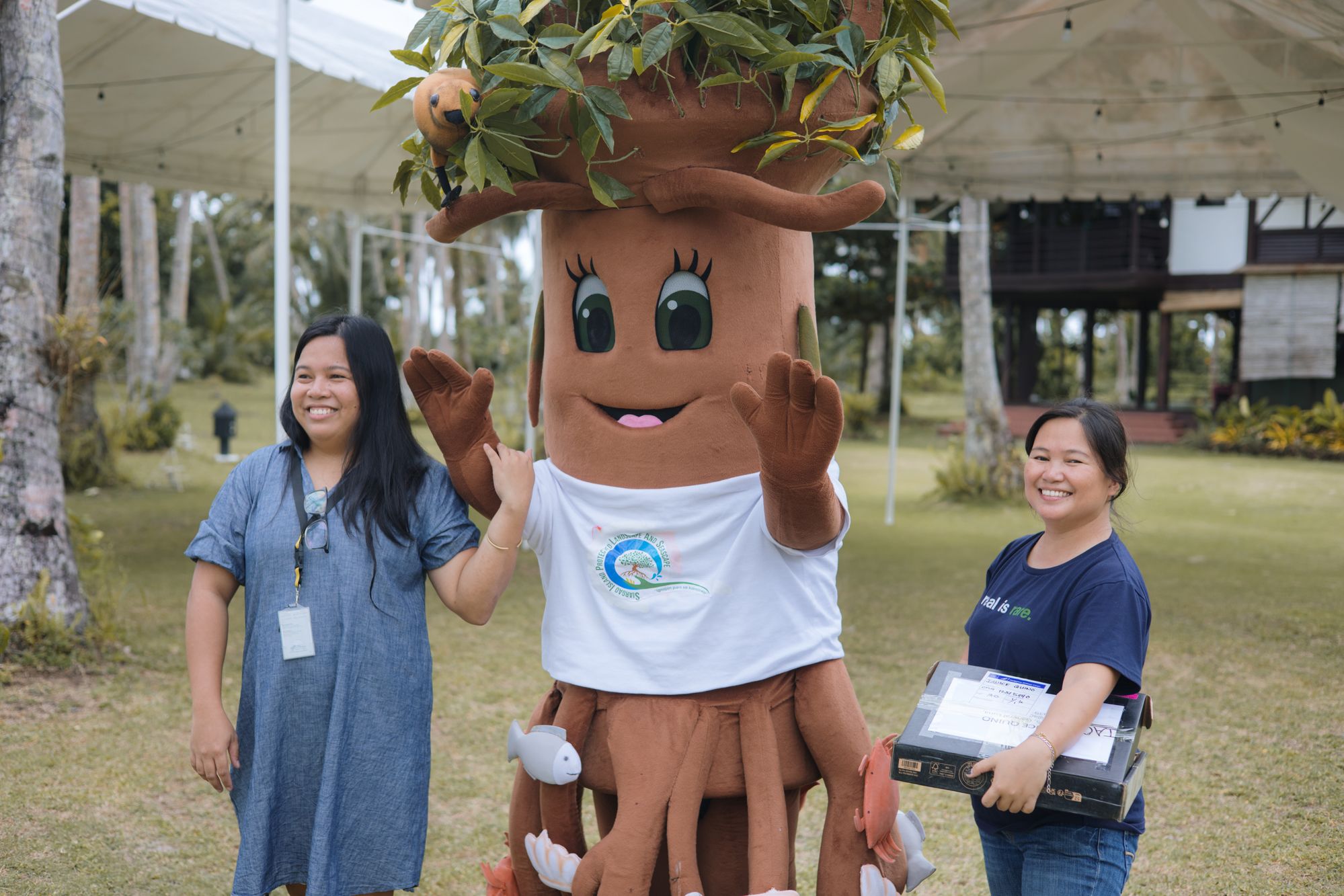 Rare Staff with Bakjuana, the mascot of the Siargao Island Protected Landscapes and Seascapes(SIPLAS), at a Coastal 500 meetup event.